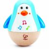 Hape - Jouet en bois - Pingouin culbuto musical